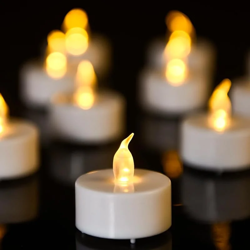 Biyanuo 100 unidades LED Velas CR2032 pilas velas sin llama, Velas de té, Velas LED, Velas parpadeantes sin Llama, Artificiales realistas a Pilas con luz Amarilla cálida — Cena a la luz de velas