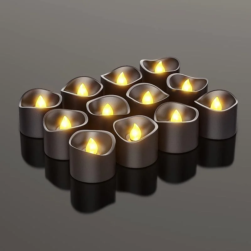 Visita la tienda de PChero PChero Velas de té LED negras, 12 unidades, funcionan con pilas, velas eléctricas parpadeantes sin llama, para Halloween, fiestas, decoración del hogar, color amarillo cálido — Cena a la luz de velas