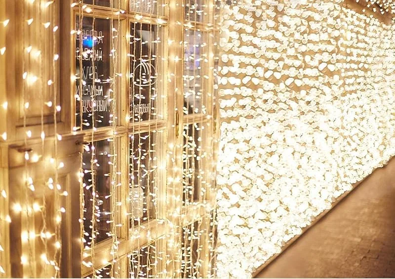 Visita la tienda de BESCOST Cortina de Luces, 6x3m Guirnaldas Luces Exterior, Cadena de Luces 600 LEDs, 8 Modos de Luz, Impermeable Cortina LED para Navidad, Boda, Fiesta, Ventana, Balcón, Jardín — Luces Navidad