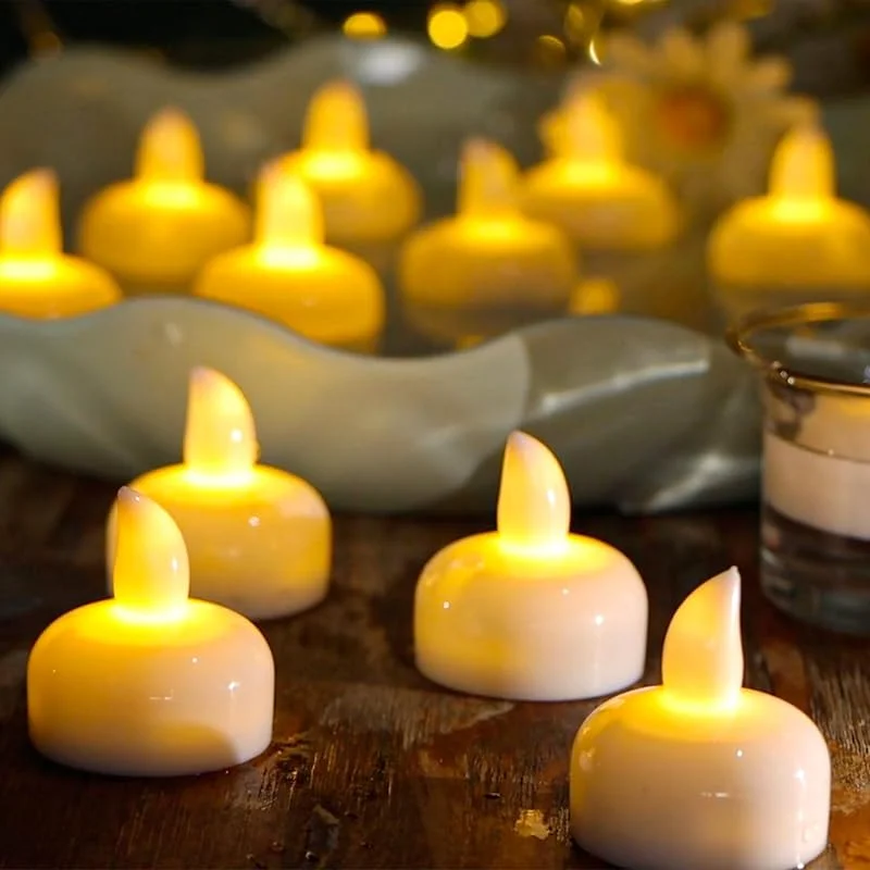 Visita la tienda de Yakpo Paquete de 24 velas flotantes sin llama, impermeables, de color blanco cálido, pilas incluidas, luces LED parpadeantes para exteriores, jarrón de centro de mesa — Cena a la luz de velas