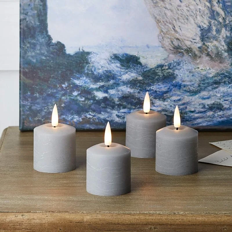 Visita la tienda de Lights4fun Lights4fun TruGlow® - Juego de 4 velas votivas LED con mando a distancia y temporizador, color gris, funciona con pilas para interior — Luces Navidad