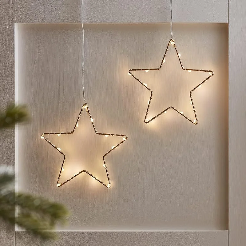 Visita la tienda de Lights4fun Lights4fun Decoración de Navidad Dúo de Estrellas Doradas de 15cm con 30 LED Blancos Cálidos a Pilas para Interiores — Decoracion Navidad